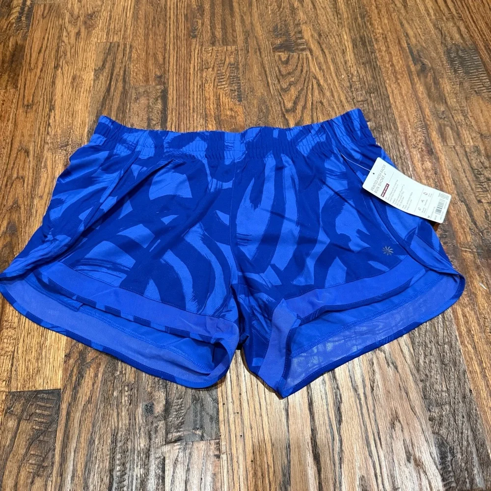 Athleta Mesh Racer Run Mid Rise Shorts - Picture 1 of 3